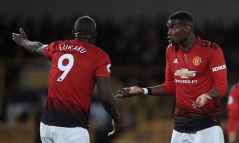 Paul Pogba argues with Romelu Lukaku during the first half.