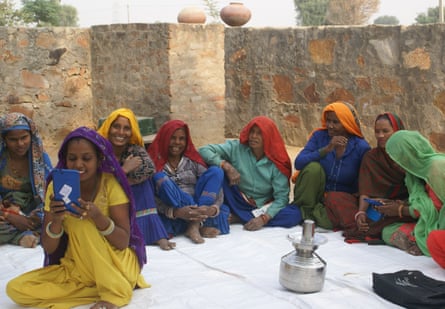 Women with tablets in Ghatagaon, a town in Odisha, India.