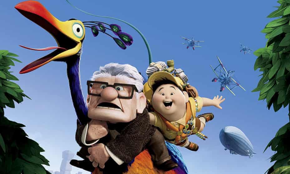 Animated characters pensioner Carl Fredricksen and a boy, Russell, flying through the air holding onto a giant bird in the film Up