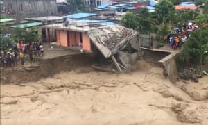 The Comoros River in Dili, East Timor was flooded, and the foundation of a house collapsed after being washed away.