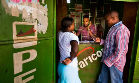 People in the Kenyan capital, Nairobi, transfer money using the M-Pesa banking service.