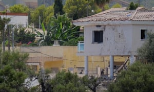 A building with shattered windows next to the site of the bomb factory blast in Alcanar, Spain