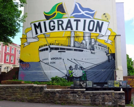 A wall painting in the St Paul’s area in Bristol showing a depiction of the Windrush and the word Migration