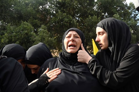 Lebanese Shiite women supporters of Hezbollah mourn as they attend the funeral of the two Hezbollah fighters Ali Ftouni and Hussam Ibrahim who were killed by Israeli attack, in Khirbet Selm village, south Lebanon.