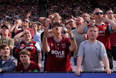 West Ham fans react to a missed chance.