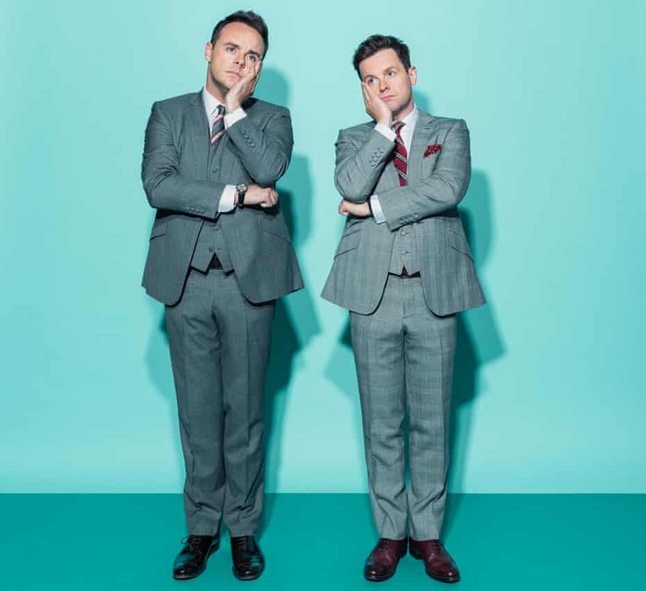 Entertainers Ant (on left) and Dec, standing next to each other with chins on hands