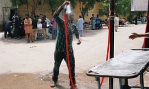 In Karachi, a man cools off at the Dr Ruth KM Pfau Civil Hospital.