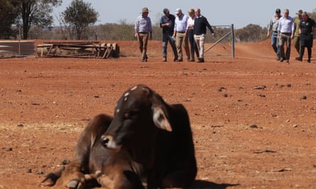 Morrison with ministers and farmers at the Tully farm in Quilpie.