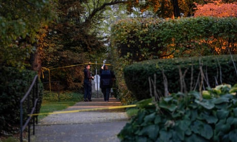 Police officers work near the scene where Samantha Woll was found dead in Detroit, Michigan, on 21 October 2023.