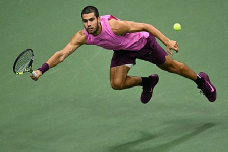 Carlos Alcaraz plays a forehand return