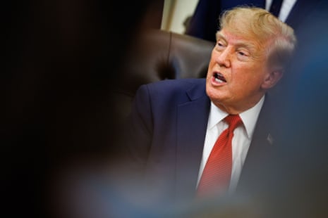 Trump speaks while seated in the Oval Office.