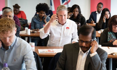 Labour leader Keir Starmer at the Labour Party national phone bank in London, speaking to voters across England as part of the get out the vote operation.