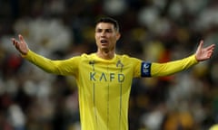 Cristiano Ronaldo spreads his arms while playing for Al-Nassr