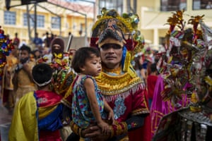 People dress up as colourful versions of Roman soldiers as they celebrate Easter Sunday in the Philippines