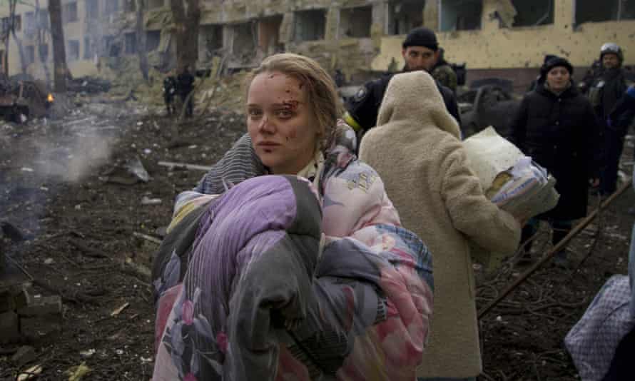 Marianna Vishegirskaya stands outside a maternity hospital that was damaged by shelling in Mariupol, Ukraine,on 9 March 2022.