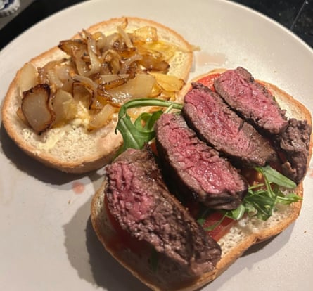 A truly sumptuous open-face steak sandwich with fried onion and rocket
