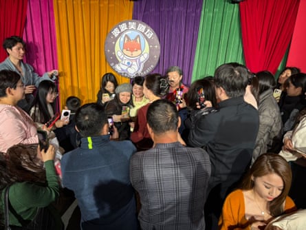 Fang Shaoli is greeted by fans after performing in Beijing.