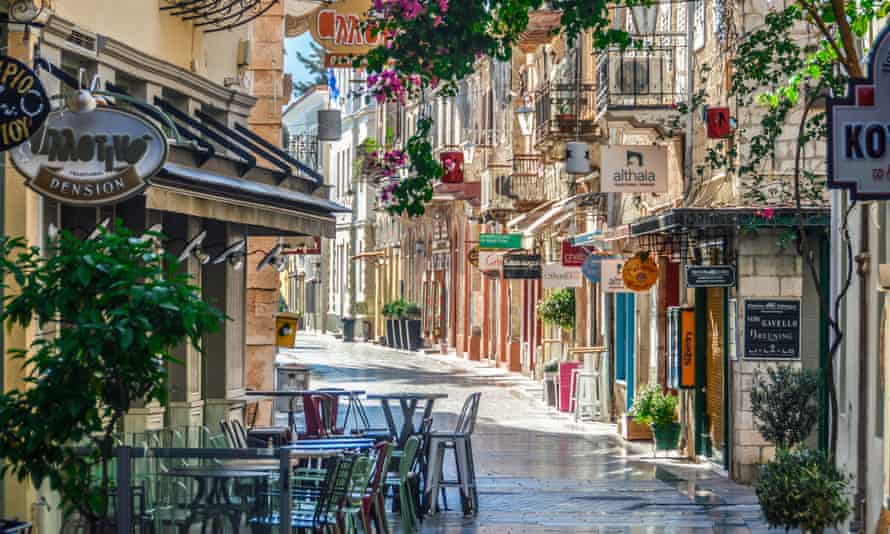Restaurants on a street in Nafplio, Greece.