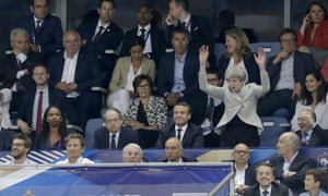 Seconds after it had passed through, Theresa May decides to join in the Mexican wave at the France v England football game at the Stade de France, Paris