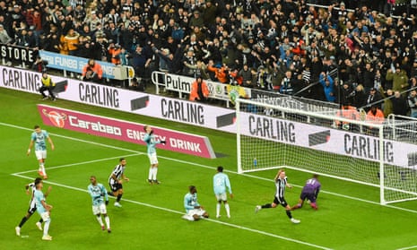 Sean Longstaff of Newcastle United celebrates scoring the second goal.