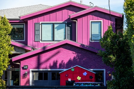 A detached house painted bright pink