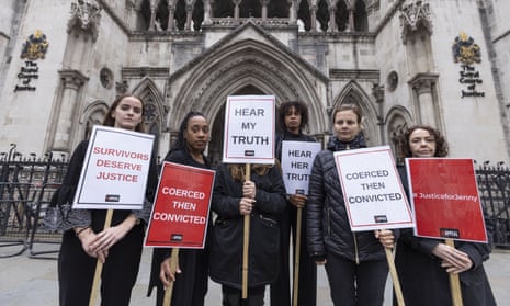 A group of protesters hold placards with slogans such as 'Coerced then convicted' and 'hear my truth' outside the court