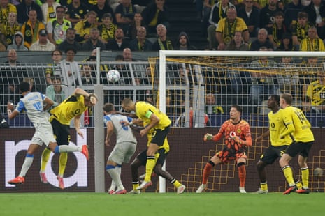 Santiago Mourino (left) heads home to put Villarreal level at Borussia Dortmund.