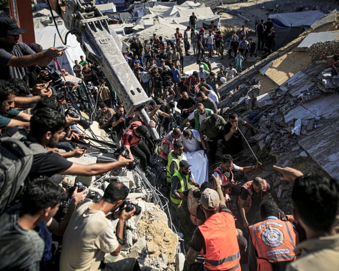 At least 12 killed after building in Gaza City damaged by Israeli strikes collapses