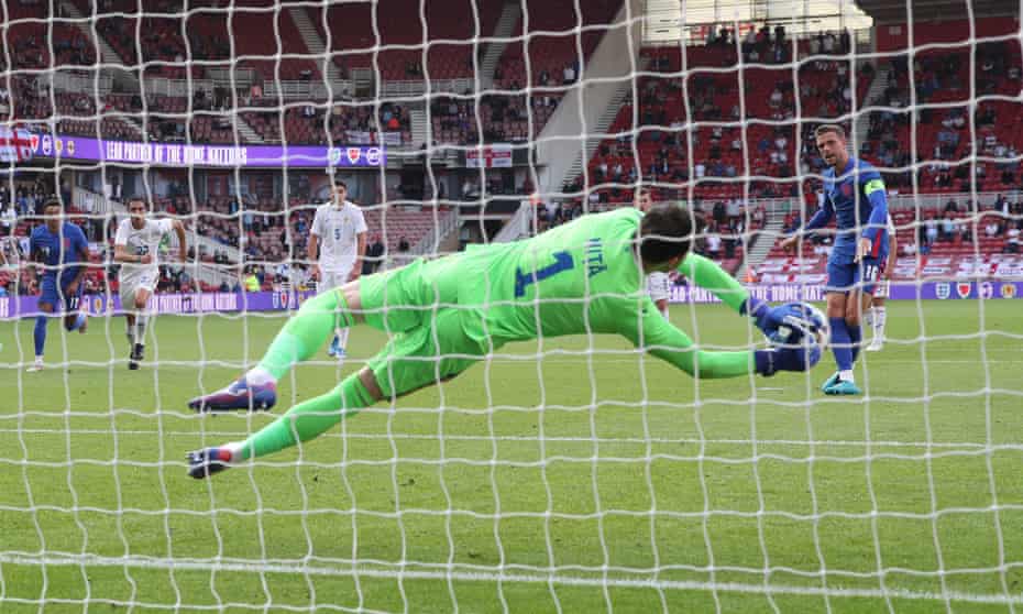 Jordan Henderson of England sees his penalty saved by Romania’s goalkeeper Florin Nita.