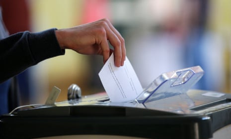 A voter casts their ballot in a referendum in Dublin, Ireland.