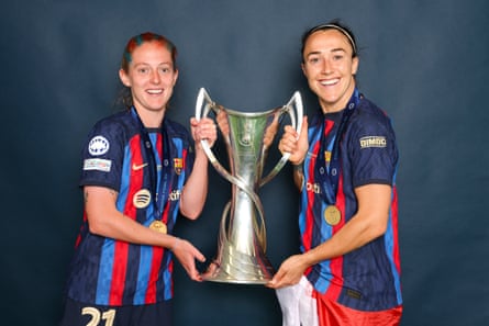 Barcelona’s Keira Walsh and Lucy Bronze pose with the Women’s Champions League trophy after the final against Wolfsburg in June