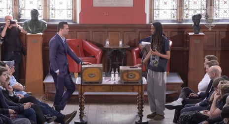 Charlie Kirk and George Abaraonye during a debate at Oxford Union in May 2025