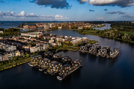 Aerial view of a housing development built on the water