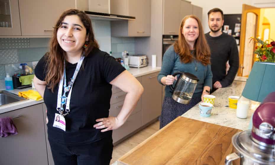 Cop26 delegate Patsy Contardo, left, with her hosts, Fiona and Matt Hooker, at their home in Glasgow