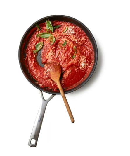 Felicity Cloake’s Timballo 04b. Fish out and discard the basil stems, taste and season, adding the sugar if necessary. Stir in the grated cheese and the basil leaves.