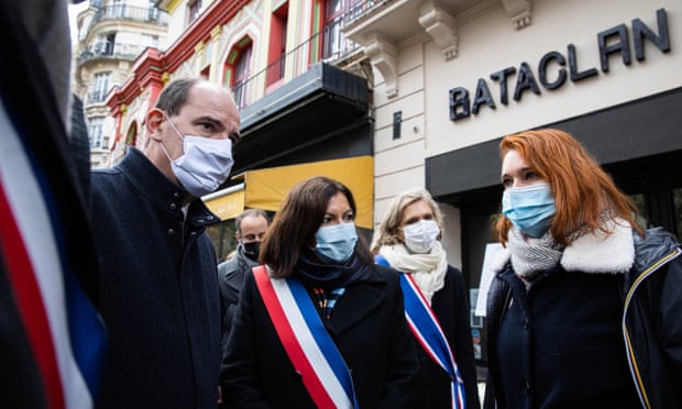  French prime minister, Jean Castex, and Paris mayor, Anne Hidalgo, pay tribute outside the Bataclan concert venue.