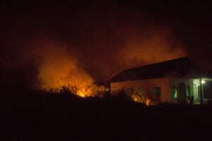 Forest fires blaze near a house in Kapuas