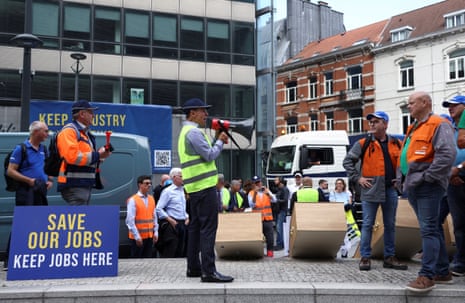 President of EUROMETAL Alexander Julius uses a megaphone during a protest organised by EUROMETAL calling for urgent action to protect Europe's steel and metals sector, outside the European Commission headquarters in Brussels today