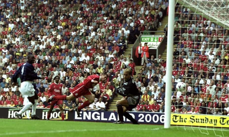 Jamie Carragher heads the ball into his own net against Manchester United at Anfield.