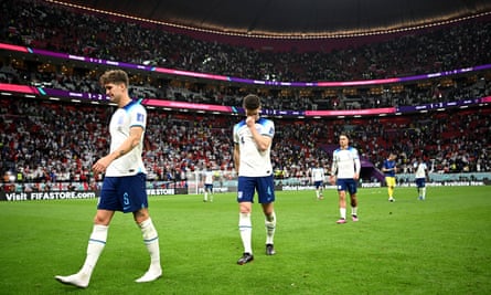 Declan Rice, John Stones and Jack Grealish leave the pitch at the end of the World Cup quarter-final between England and France.