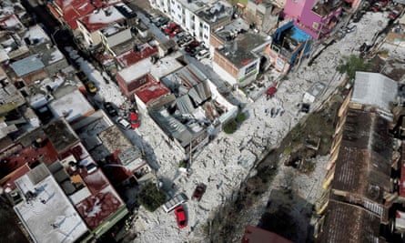 Aerial view of vehicles buried in hail in the streets in the eastern area of Guadalajara