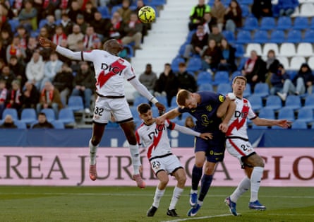 Rayo’s Nobel Mendy rises for a header against Atlético