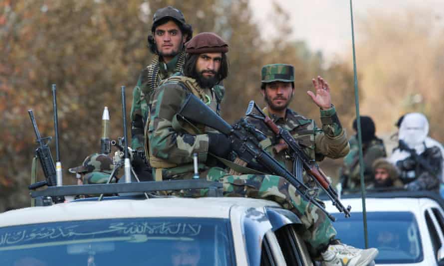 ‘We’re all hip-hop family’: the artists fighting to get Afghan breakdancers to safety | Global development 5 Taliban sit on an army vehicle during Taliban military parade in Kabul