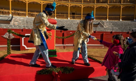 Pages from the Three Magic Kings ‘Tres Reyes Magos’, (also known as the Three Wise Men) receive a letter from girls at Aranjuez’s bullring as an alternative to the traditional parade in an attempt to observe health safety measures against coronavirus