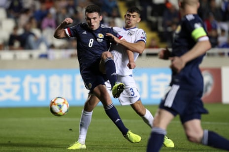 John McGinn put Scotland back in front with a controlled finish.