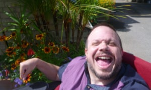 A Leonard Cheshire service user enjoys the garden at Greenhill House in Somerset. The UK’s disabled people are in danger of being ‘forgotten’, says the charity’s chief executive.