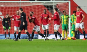Manchester United’s Bruno Fernandes appeals to referee David Coote after a penalty was awarded for his foul on West Bromwich Albion’s Conor Gallagher .