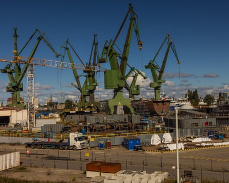 Green shipping cranes at the Gdańsk shipyard