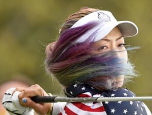American golfer Michelle Wie hits a ball in the singles at the Solheim Cup in St Leon-Rot, Germany.