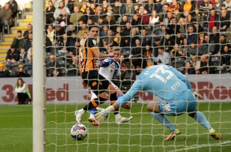 Blackburn Rovers’ Sammie Szmodics slots home to open the scoring against Hull City.